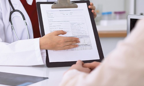 Doctor reviewing medical documents